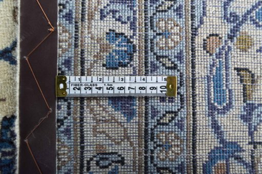 Surface texture of 2000s Kashan rug with natural Wool and intricate pattern