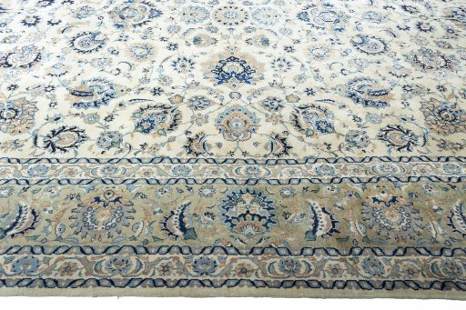 Corner detail of 1950s Kashan rug showing border pattern and Wool pile