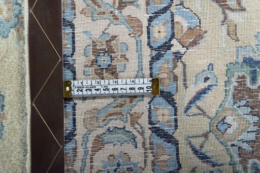Backside of handmade 1950s Kashan rug showing knot structure and weave density