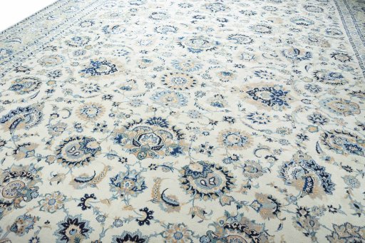 Backside of handmade 1950s Kashan rug showing knot structure and weave density