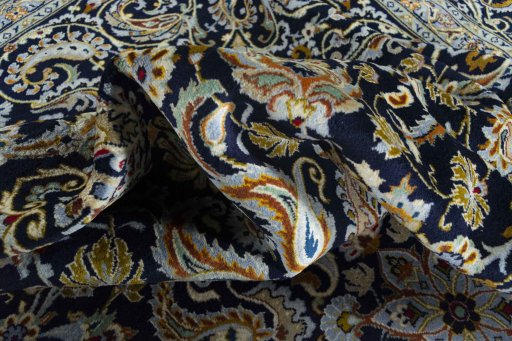 Surface texture of 2000s Kashan rug with natural Wool and intricate pattern
