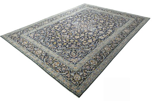 Corner detail of 2000s Kashan rug showing border pattern and Wool pile
