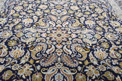 Central medallion detail of 2000s Kashan rug from Iran / Persia