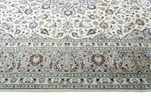 Corner detail of New Kashan rug showing border pattern and Wool pile