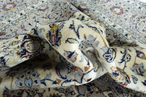 Surface texture of New Kashan rug with natural Wool and intricate pattern