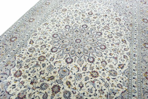 Backside of handmade New Kashan rug showing knot structure and weave density