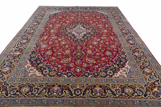 Surface texture of 2000s Kashan rug with natural Wool and intricate pattern