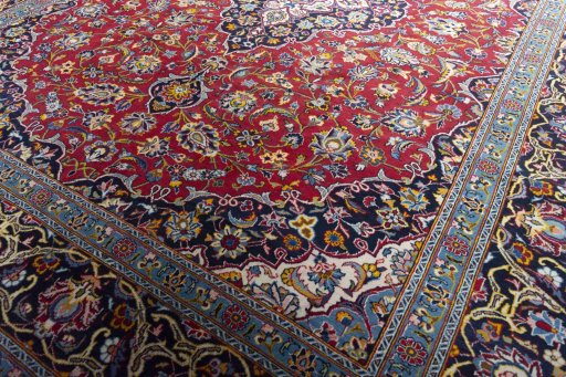 Close-up detail of 2000s Kashan rug from Iran / Persia showing Wool weave