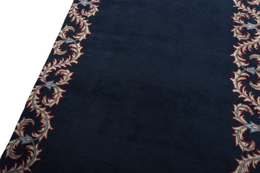Surface texture of 2000s Kashan rug with natural Wool and intricate pattern
