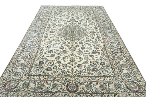 Surface texture of 2000s Kashan rug with natural Wool and intricate pattern