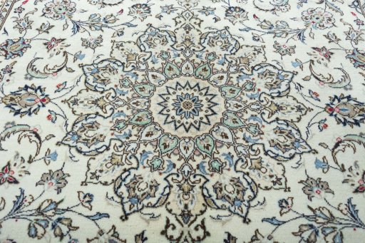 Central medallion detail of 2000s Kashan rug from Iran / Persia