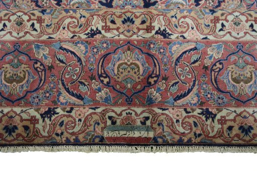 Surface texture of 1930s Kashan rug with natural Wool and intricate pattern