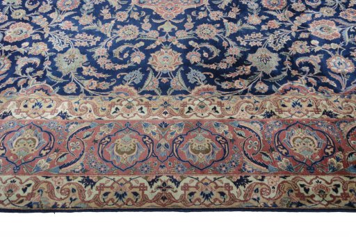 Backside of handmade 1930s Kashan rug showing knot structure and weave density