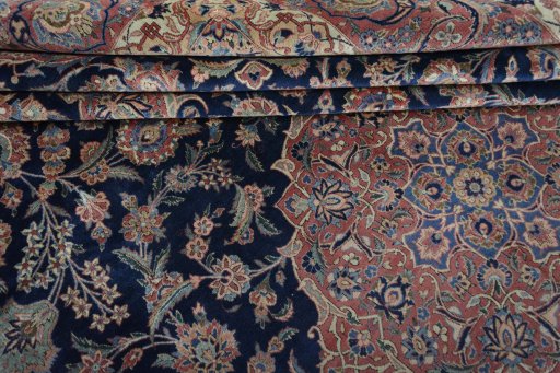 Central medallion detail of 1930s Kashan rug from Iran / Persia