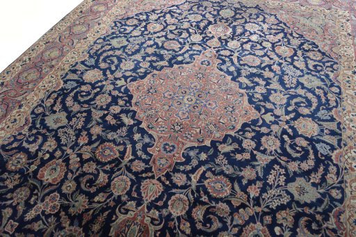 Backside of handmade 1930s Kashan rug showing knot structure and weave density