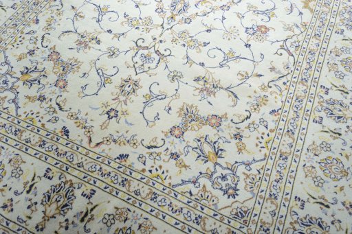 Close-up detail of 2000s Kashan rug from Iran / Persia showing Wool weave