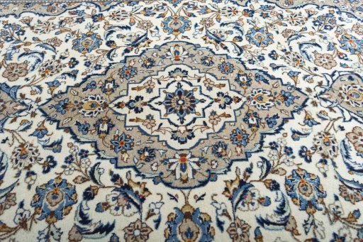 Central medallion detail of 2000s Kashan rug from Iran / Persia