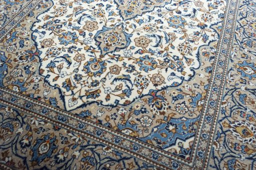 Close-up detail of 2000s Kashan rug from Iran / Persia showing Wool weave