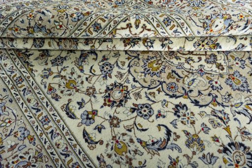 Close-up detail of 2000s Kashan rug from Iran / Persia showing Wool weave