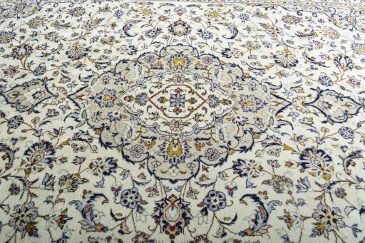 Central medallion detail of 2000s Kashan rug from Iran / Persia