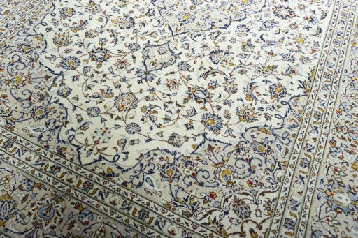Close-up detail of 2000s Kashan rug from Iran / Persia showing Wool weave