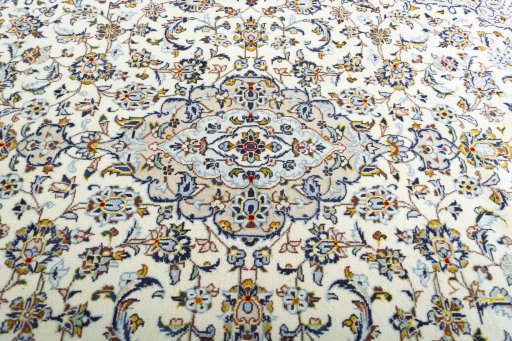 Central medallion detail of 2000s Kashan rug from Iran / Persia