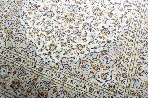 Close-up detail of 2000s Kashan rug from Iran / Persia showing Wool weave