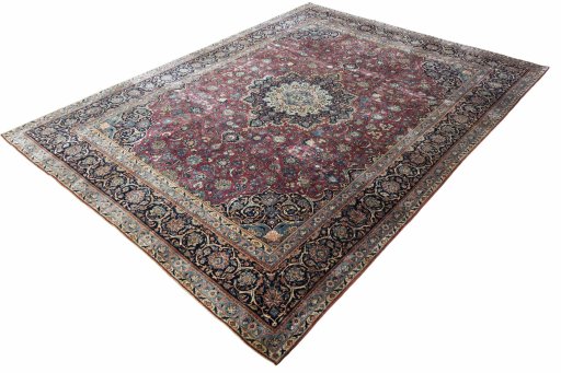 Corner detail of 1930s Kashan rug showing border pattern and Wool pile