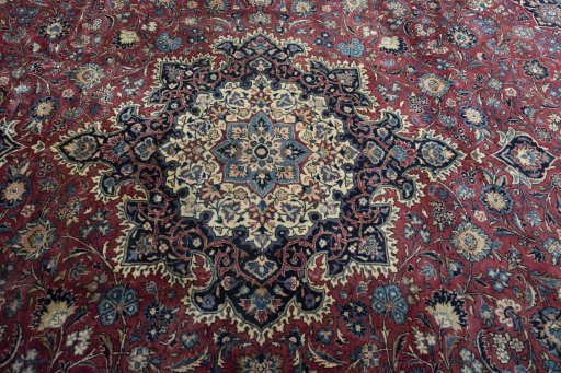 Central medallion detail of 1930s Kashan rug from Iran / Persia