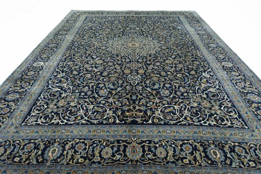 Surface texture of 2000s Kashan rug with natural Wool and intricate pattern