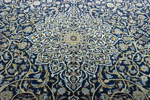 Central medallion detail of 2000s Kashan rug from Iran / Persia