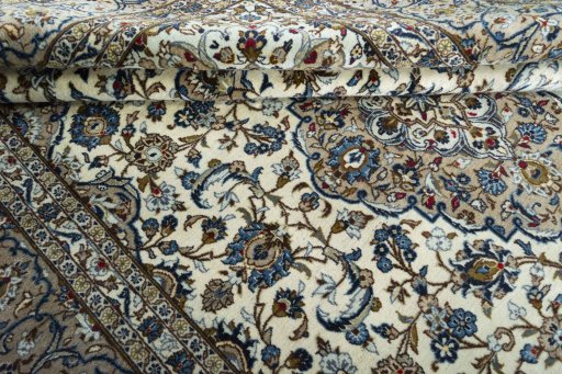 Close-up detail of 2000s Kashan rug from Iran / Persia showing Wool weave