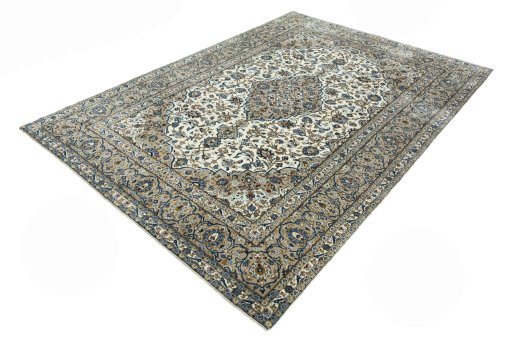 Corner detail of 2000s Kashan rug showing border pattern and Wool pile