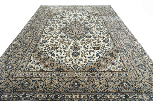 Surface texture of 2000s Kashan rug with natural Wool and intricate pattern
