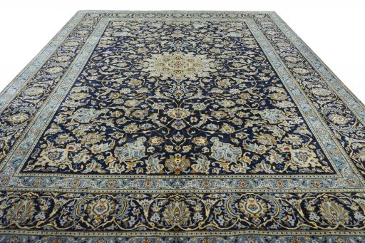Surface texture of 2000s Kashan rug with natural Wool and intricate pattern