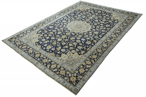 Corner detail of 2000s Kashan rug showing border pattern and Wool pile