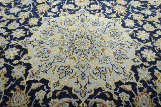 Central medallion detail of 2000s Kashan rug from Iran / Persia