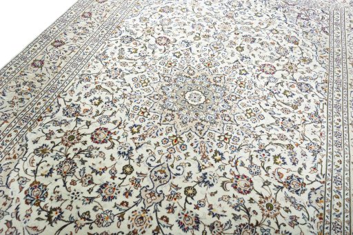 Backside of handmade 2000s Kashan rug showing knot structure and weave density