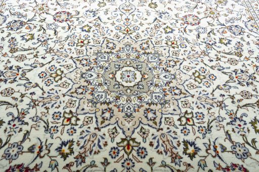 Central medallion detail of 2000s Kashan rug from Iran / Persia