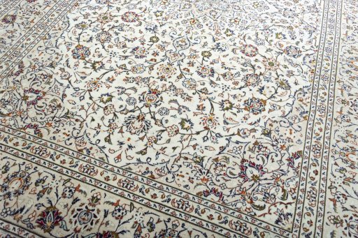 Close-up detail of 2000s Kashan rug from Iran / Persia showing Wool weave