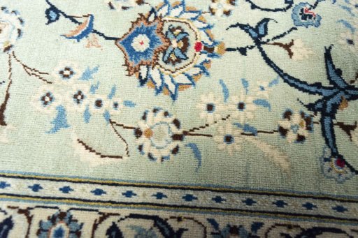 Close-up detail of 2000s Kashan rug from Iran / Persia showing Wool weave
