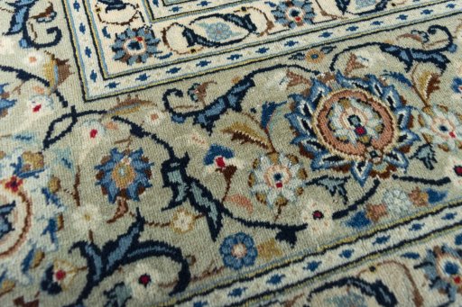 Surface texture of 2000s Kashan rug with natural Wool and intricate pattern