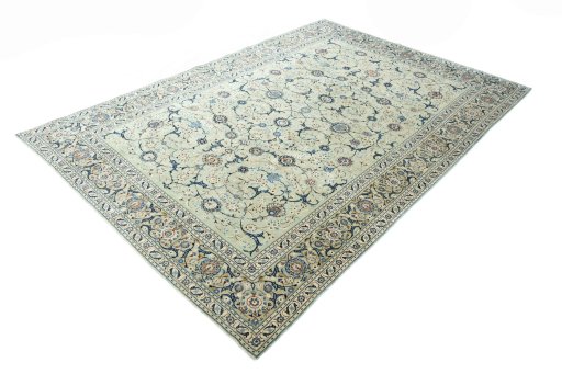 Corner detail of 2000s Kashan rug showing border pattern and Wool pile