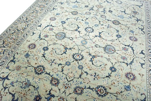 Backside of handmade 2000s Kashan rug showing knot structure and weave density