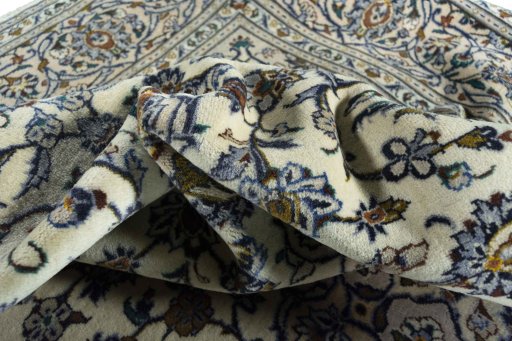 Surface texture of 2000s Kashan rug with natural Wool and intricate pattern