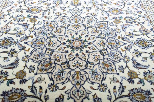 Central medallion detail of 2000s Kashan rug from Iran / Persia