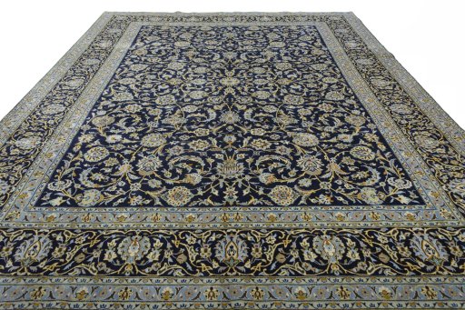 Surface texture of 2000s Kashan rug with natural Wool and intricate pattern