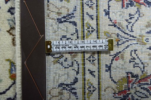 Central medallion detail of 2000s Kashan rug from Iran / Persia