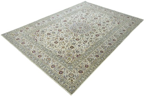 Corner detail of 2000s Kashan rug showing border pattern and Wool pile