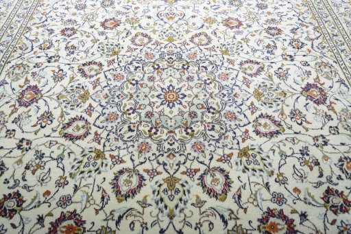 Central medallion detail of 2000s Kashan rug from Iran / Persia